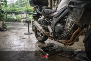big bike oil change interval Philippines motorcycle engine oil change in home garage tropical climate maintenance