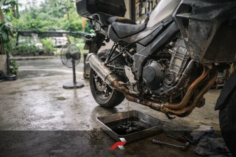 big bike oil change interval Philippines motorcycle engine oil change in home garage tropical climate maintenance