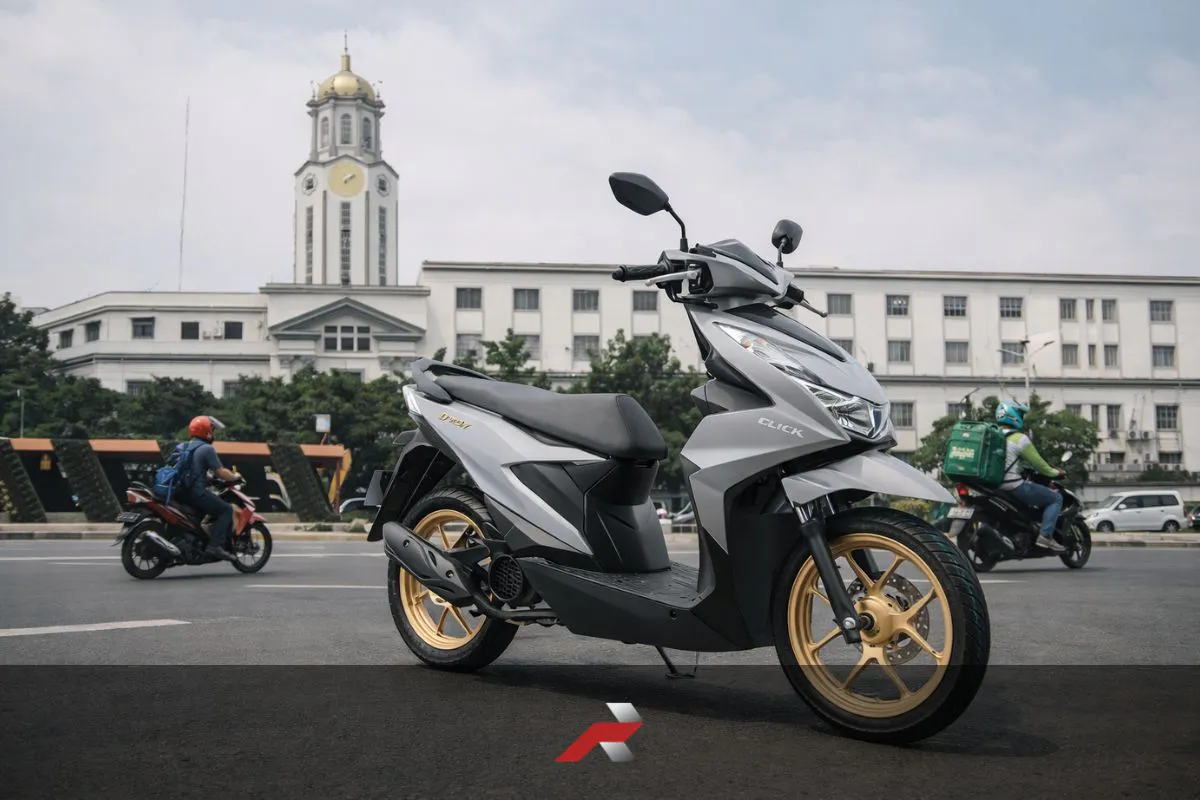 Honda Click scooter in front of Manila City Hall representing Honda Philippines sells over 1 million motorcycles in 2025