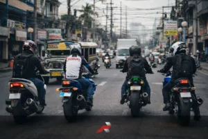 Motorcycles riding in Manila traffic representing Honda Yamaha Suzuki Kawasaki Philippine motorcycle market share and motorcycle industry growth
