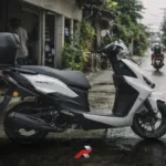Kymco Agility ECO 125i scooter parked on a wet Philippine street showing real daily commute conditions and urban riding environment