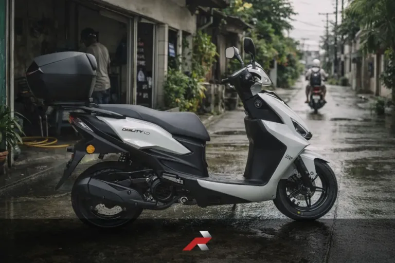 Kymco Agility ECO 125i scooter parked on a wet Philippine street showing real daily commute conditions and urban riding environment