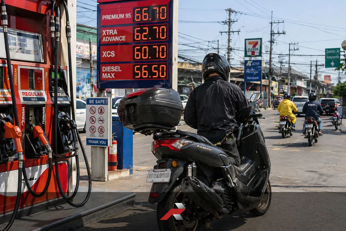 Scooter rider refueling at a gasoline station in heavy Philippine traffic showing real world fuel efficiency conditions