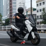 Yamaha Nmax CVT Maintenance Guide image showing a rider driving an Nmax Tech in a Manila city setting