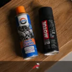 Best Chain Cleaner and Chain Lube Philippines featuring Mototek Chain Cleaner and Motul C2 Chain Lube beside a motorcycle sprocket