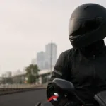 Motorcycle Helmet Guide Philippines featured image showing a rider wearing a full-face helmet on a city road